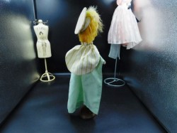 hand puppet green dress bk